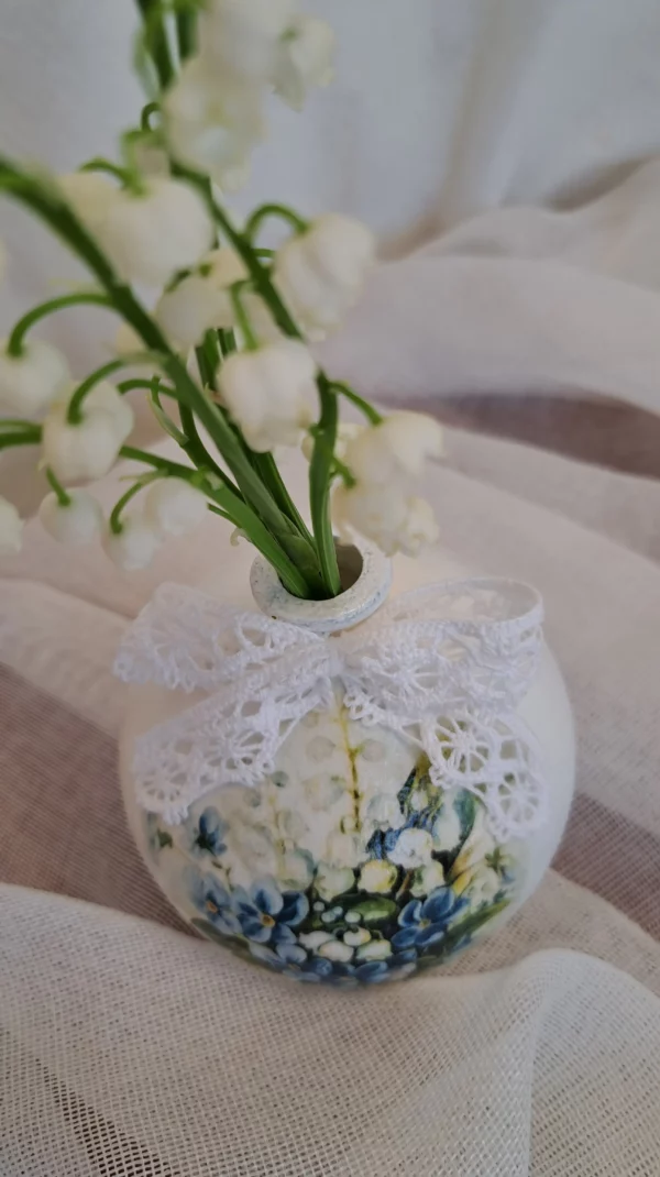 A Vase With Flowers In It